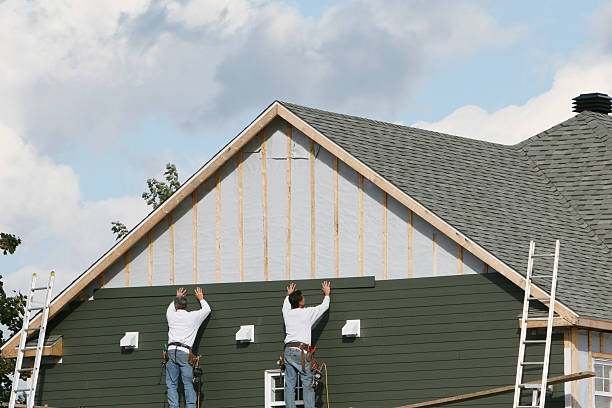 Professional Siding Contractor technician working in Plainview, TX